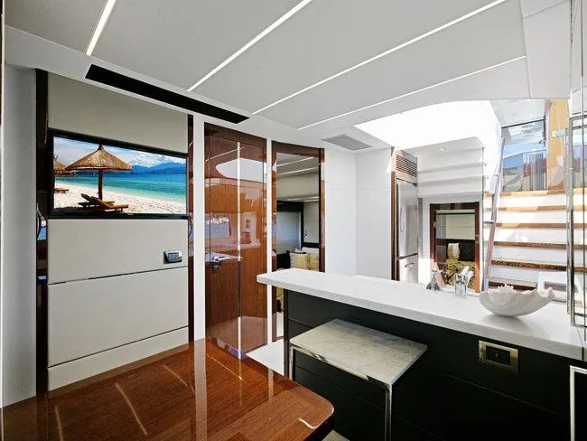 Slide: The Image of Luxurious interior of 2018 Sunseeker Predator 74 yacht with modern design and elegant furnishings. - 16