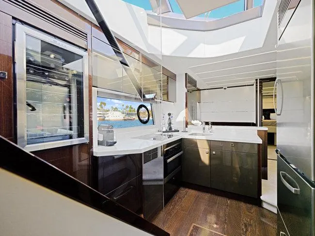 Slide: The Image of Luxurious kitchen interior of 2018 Sunseeker Predator 74 yacht with modern appliances. - 25