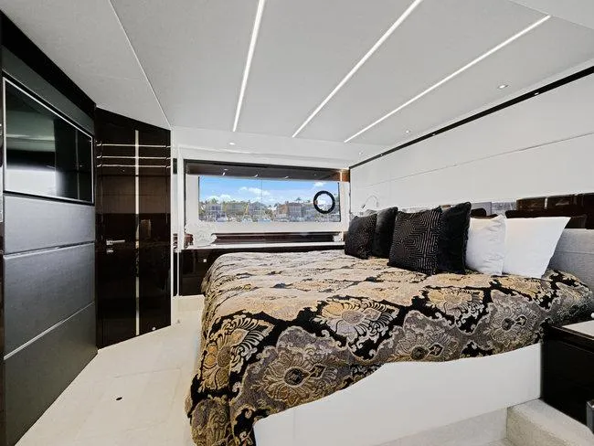 Slide: The Image of Luxurious bedroom interior of 2018 Sunseeker Predator 74 yacht with elegant bedding and modern design. - 28