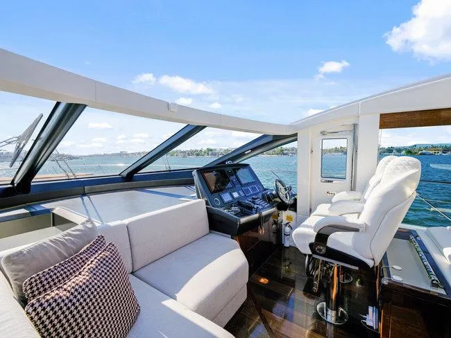 Slide: The Image of Interior of 2018 Sunseeker Predator 74 yacht with luxurious seating and modern helm. - 42