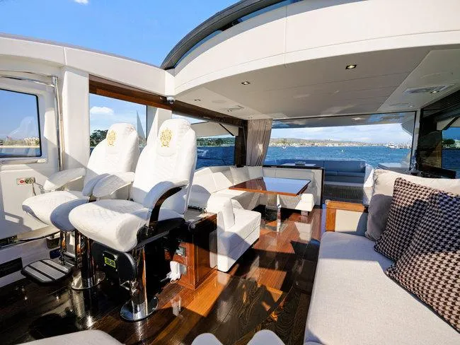 Slide: The Image of Luxurious interior of 2018 Sunseeker Predator 74 yacht with plush seating and ocean view. - 45