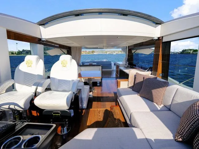 Slide: The Image of Luxurious interior of 2018 Sunseeker Predator 74 yacht with plush seating and ocean view. - 47