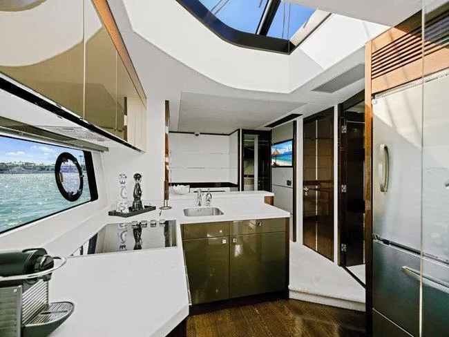 Slide: The Image of Modern kitchen interior on 2018 Sunseeker Predator 74 yacht with ocean view. - 7