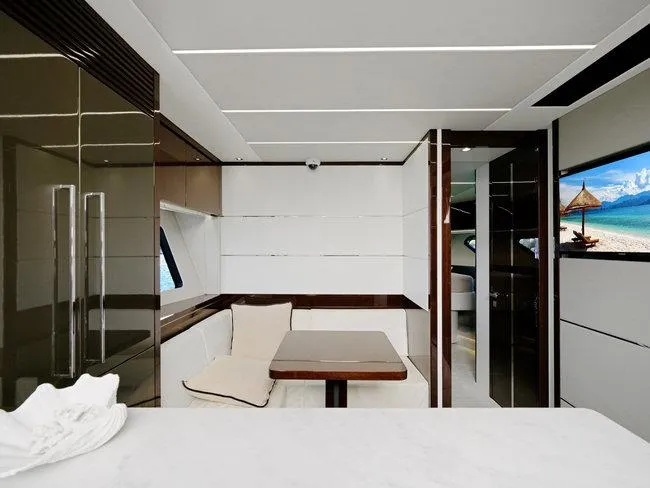 Slide: The Image of Luxurious interior of 2018 Sunseeker Predator 74 yacht with modern furnishings. - 8