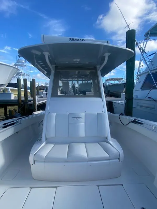 Slide: The Image of 2019 Invincible 39 Open Fisherman boat with white seating and T-top. - 18