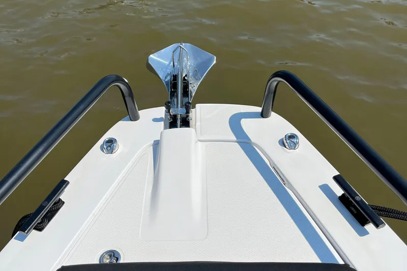 Slide: The Image of Bow of 2020 Axopar 37 XC boat with anchor and railings. - 28