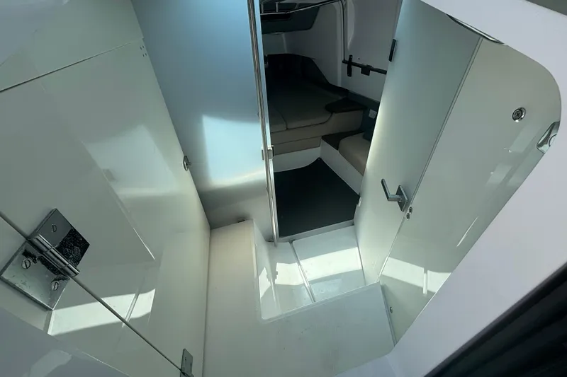 Slide: The Image of Interior cabin view of 2020 Axopar 37 XC Cross Cabin, featuring sleek design and modern amenities. - 18