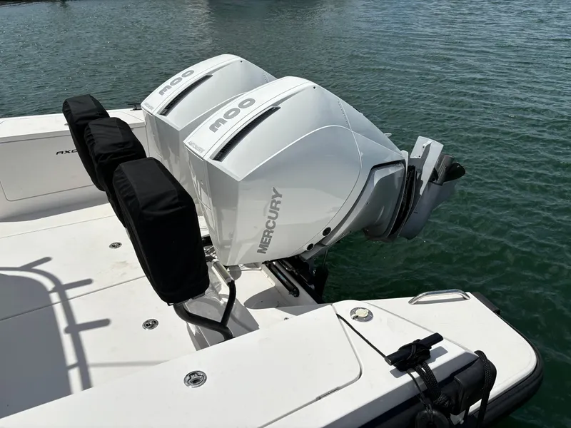 Slide: The Image of Twin Mercury outboard engines on a 2020 Axopar 37 XC boat. - 30