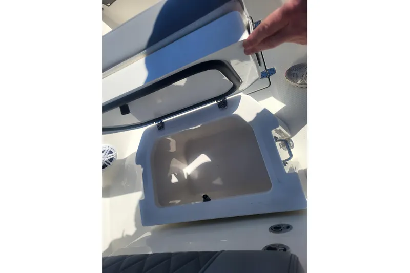 Slide: The Image of Open storage compartment on 2024 Pathfinder 2200 TRS boat, showcasing interior space. - 23
