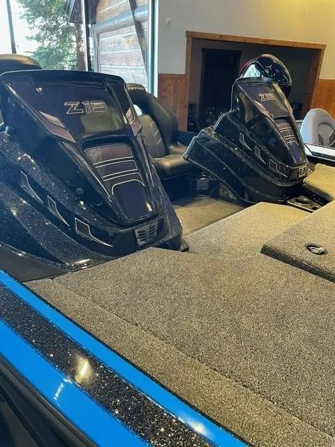 Slide: The Image of 2024 Nitro Z19 boat with dual engines in a showroom. - 3