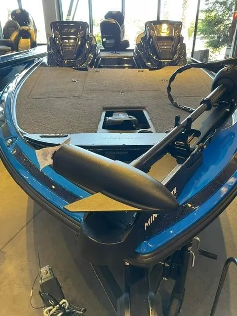 Slide: The Image of 2024 Nitro Z19 fishing boat with trolling motor and spacious deck. - 4