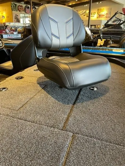 Slide: The Image of 2024 Nitro Z19 boat with a cushioned seat on a carpeted deck. - 6