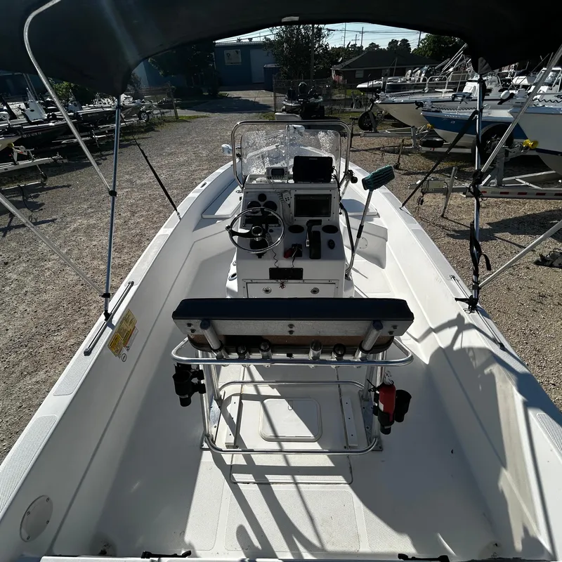 Slide: The Image of 2008 Skeeter ZX2250 boat interior with console and seating. - 11