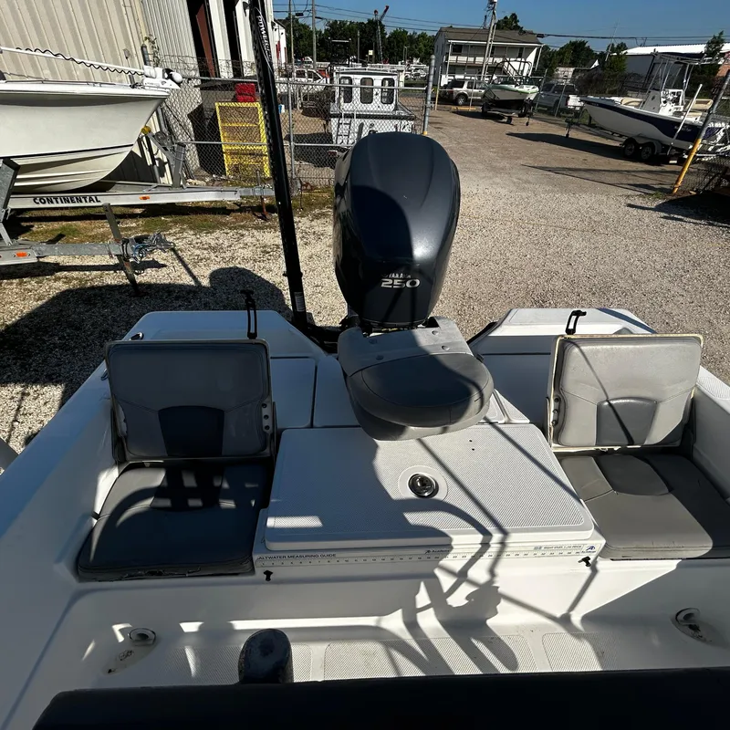 Slide: The Image of 2008 Skeeter ZX2250 boat with Yamaha 250 outboard motor in a boatyard. - 15