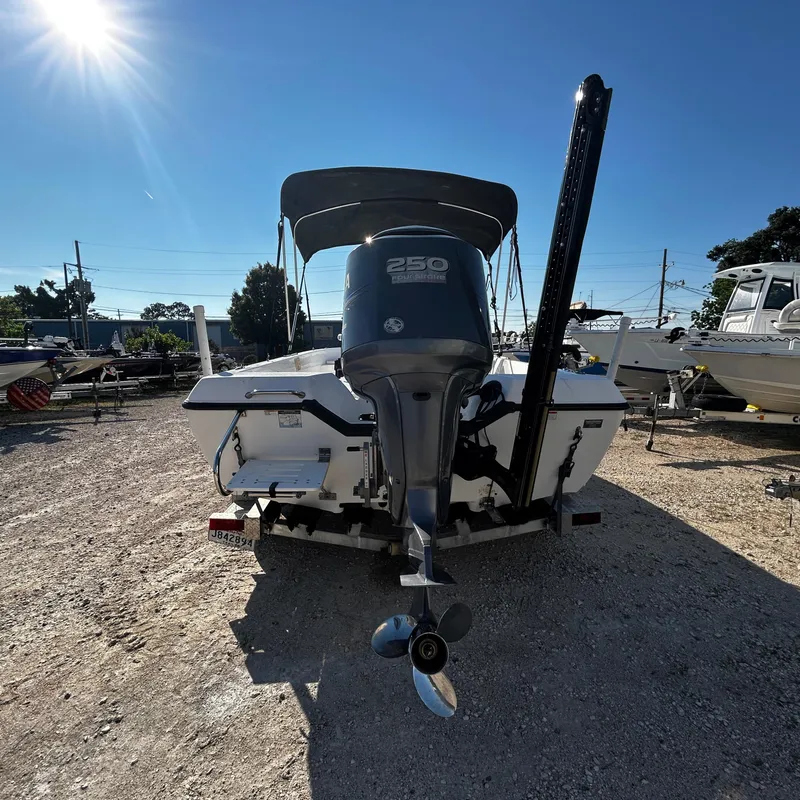Slide: The Image of 2008 Skeeter ZX2250 boat with Yamaha 250 outboard motor in a sunny marina. - 3