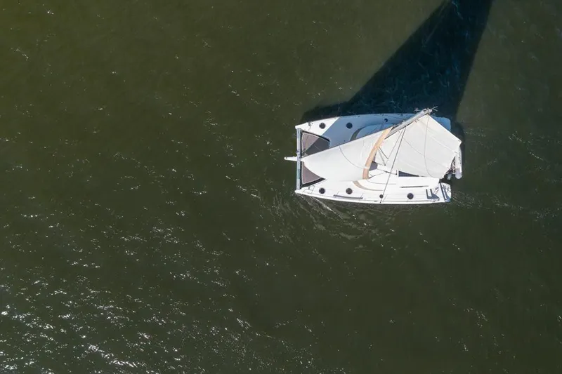 Slide: The Image of Aerial view of 2013 Fountaine Pajot Lipari 41 sailing on open water. - 13