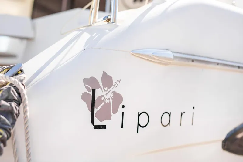 Slide: The Image of 2013 Fountaine Pajot Lipari 41 catamaran with logo detail. - 27