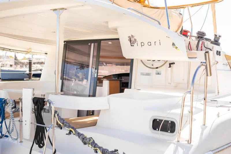 Slide: The Image of 2013 Fountaine Pajot Lipari 41 catamaran, featuring spacious deck and modern design. - 29