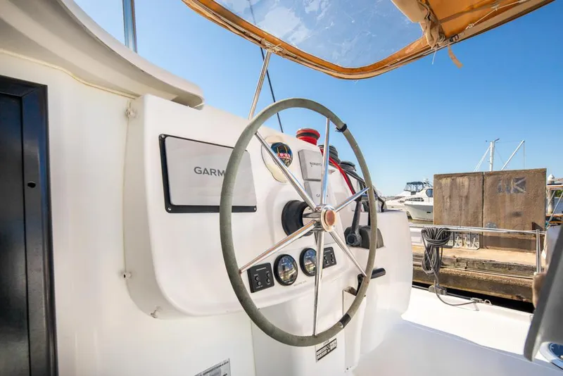 Slide: The Image of Steering wheel of 2013 Fountaine Pajot Lipari 41 catamaran at dock. - 36