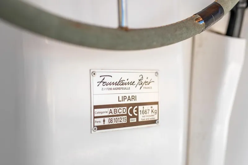 Slide: The Image of Fountaine Pajot Lipari 41, 2013 model, identification plate on a white surface. - 38