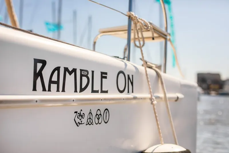 Slide: The Image of Fountaine Pajot Lipari 41 catamaran, 2013, named "Ramble On" docked in sunny marina. - 39