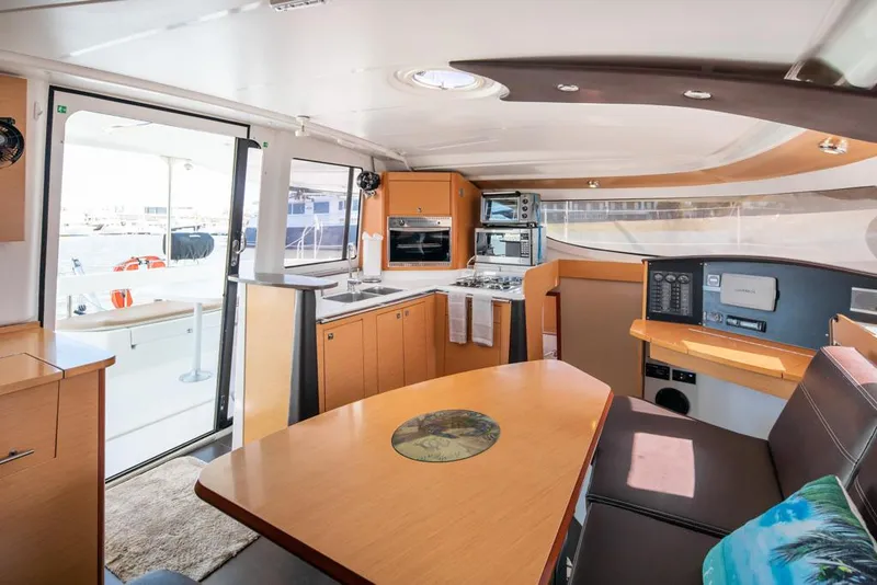 Slide: The Image of Interior of 2013 Fountaine Pajot Lipari 41 catamaran, featuring modern kitchen and dining area. - 40