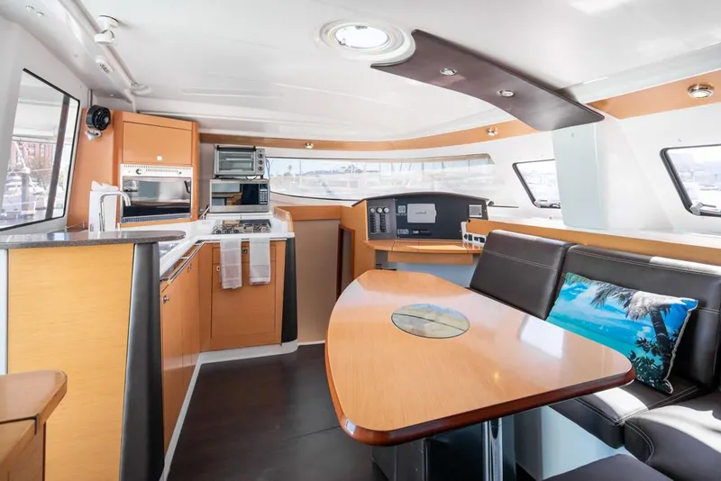 Slide: The Image of Interior of 2013 Fountaine Pajot Lipari 41 catamaran with modern kitchen and dining area. - 43