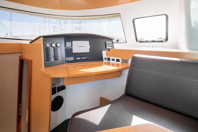 Slide: The Image of Interior of 2013 Fountaine Pajot Lipari 41 catamaran with navigation controls and seating. - 44