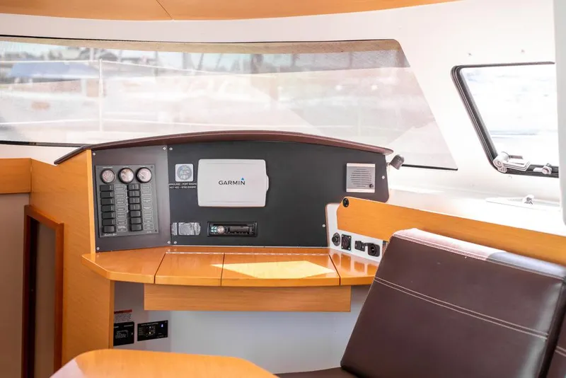 Slide: The Image of Interior helm of 2013 Fountaine Pajot Lipari 41 catamaran with navigation equipment. - 45