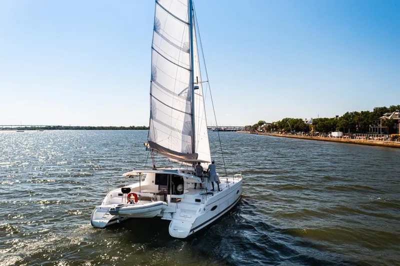 Slide: The Image of Sailing catamaran Fountaine Pajot Lipari 41, 2013 model, cruising on open water. - 8