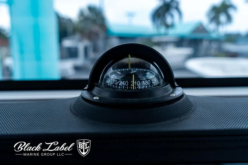 Slide: The Image of Compass on 2024 Sea Fox 231 Bay Fox Center Console boat dashboard. - 17