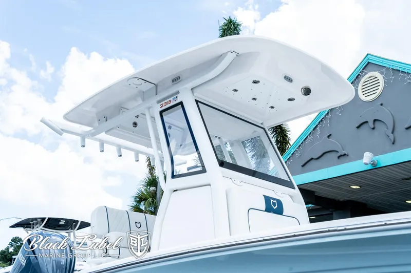 Slide: The Image of 2024 Sea Fox 231 Bay Fox Center Console boat with T-top, viewed from below. - 3