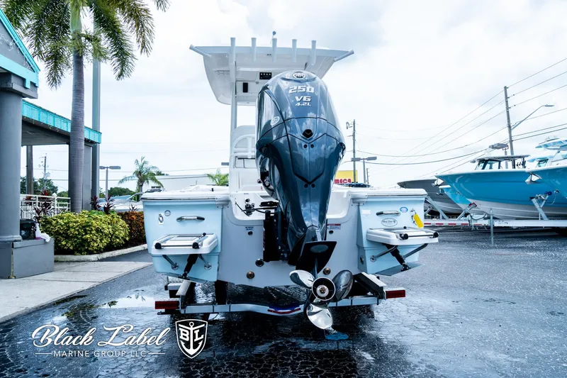 Slide: The Image of 2024 Sea Fox 231 Bay Fox Center Console boat with powerful outboard motor. - 6