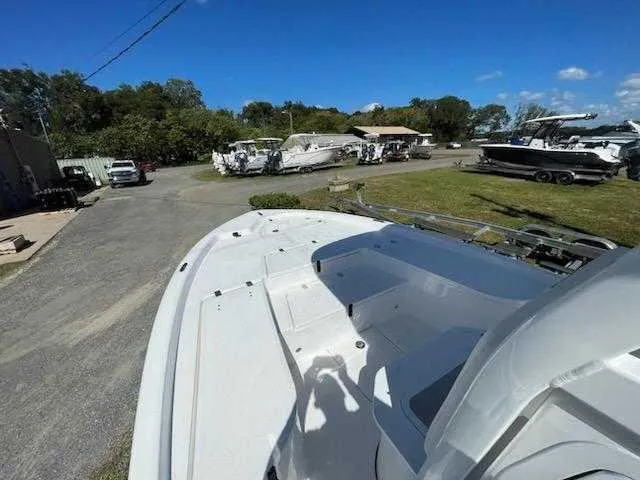 Slide: The Image of 2024 Sea Fox 231 Bay Fox Center Console boat at a marina. - 13