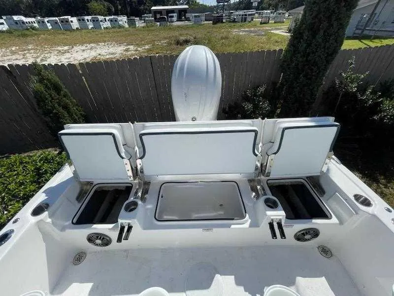 Slide: The Image of 2024 Sea Fox 231 Bay Fox Center Console boat with open storage compartments. - 16