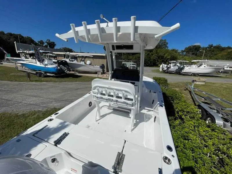 Slide: The Image of 2024 Sea Fox 231 Bay Fox Center Console boat in a marina. - 9