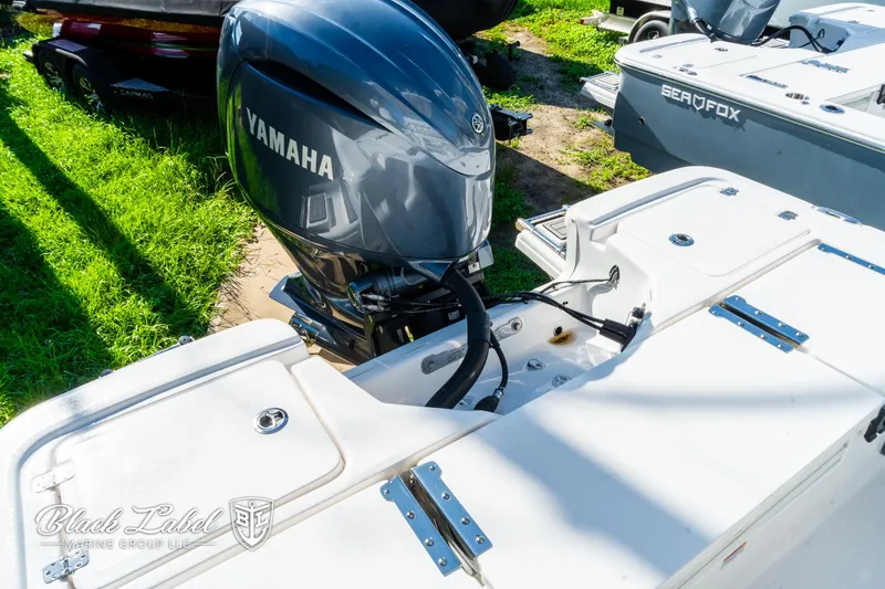 Slide: The Image of 2024 Sea Fox 231 Bay Fox Center Console with Yamaha outboard engine. - 24