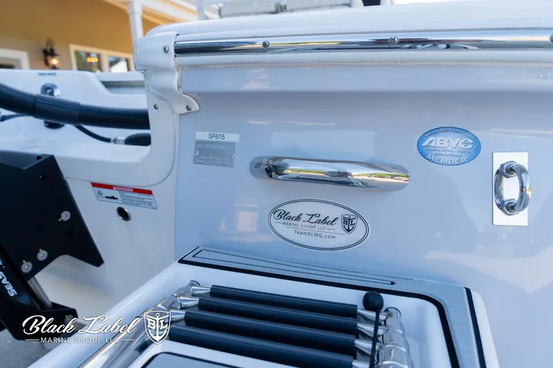 Slide: The Image of 2024 Sea Fox 231 Bay Fox Center Console boat detail with Black Label Marine Group logo. - 4