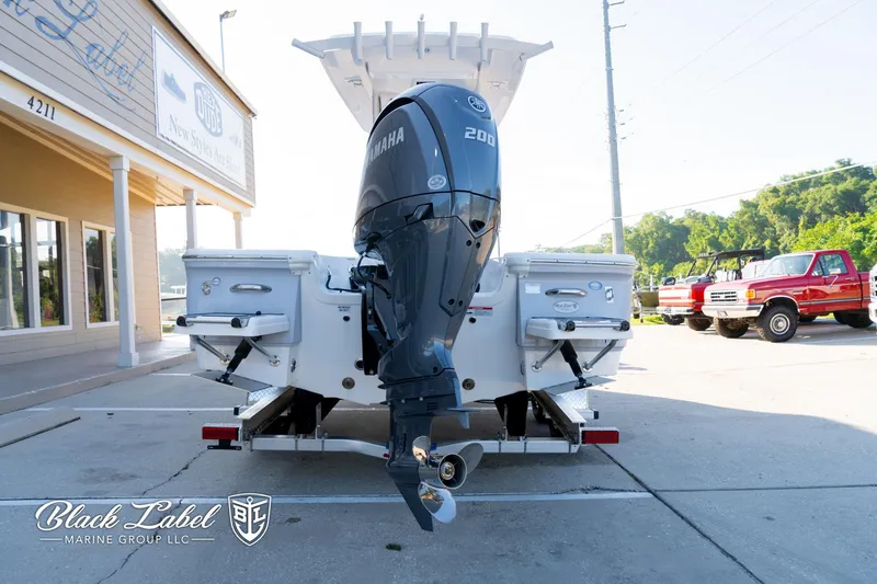 Slide: The Image of 2024 Sea Fox 231 Bay Fox Center Console with Yamaha 200 engine at dealership. - 6