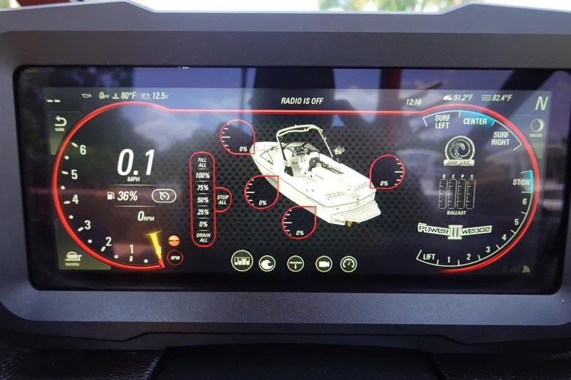 Slide: The Image of 2023 Malibu 23 LSV boat dashboard display showing speed, ballast, and other controls. - 25