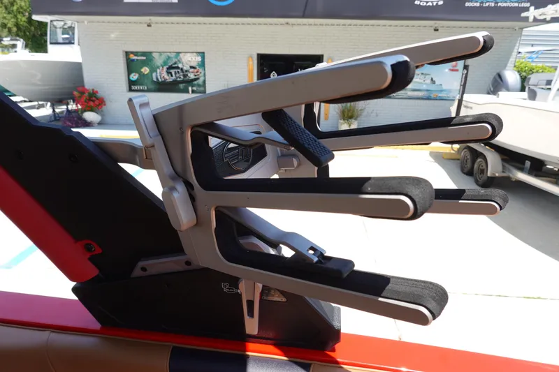 Slide: The Image of 2023 Malibu 23 LSV boat wakeboard rack close-up at dealership. - 28