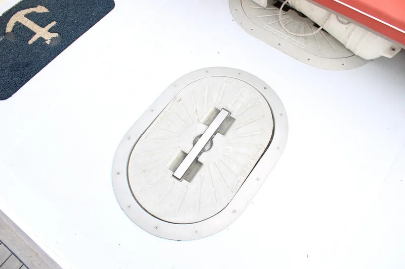 Slide: The Image of 1996 Webbers Cove 26 deck with hatch and anchor mat. - 14