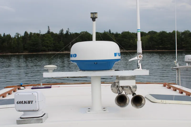 Slide: The Image of 1996 Webbers Cove 26 boat with radar and navigation equipment on deck. - 31