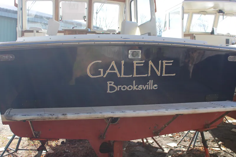 Slide: The Image of 1996 Webbers Cove 26 boat named "Galene" in Brooksville, rear view. - 38