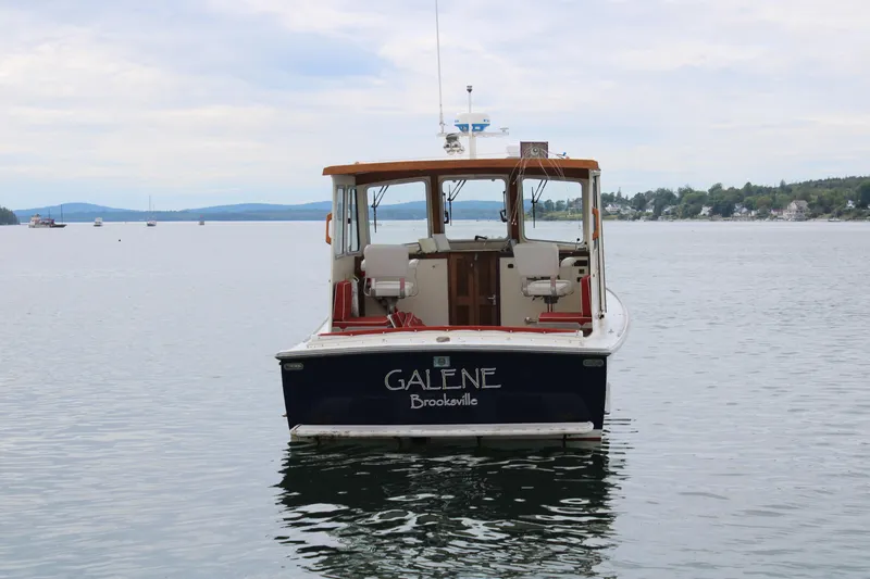 Slide: The Image of 1996 Webbers Cove 26 boat named "Galene" on calm water near Brooksville. - 5