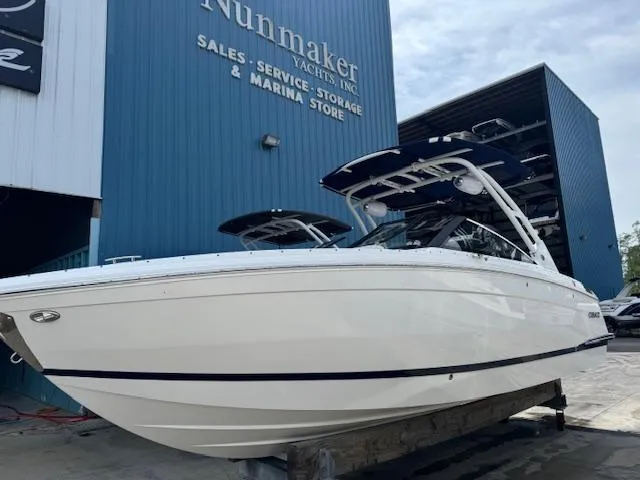 Slide: The Image of 2024 Cobalt R8 boat displayed at Nunmaker Yachts, showcasing sleek design and modern features. - 0