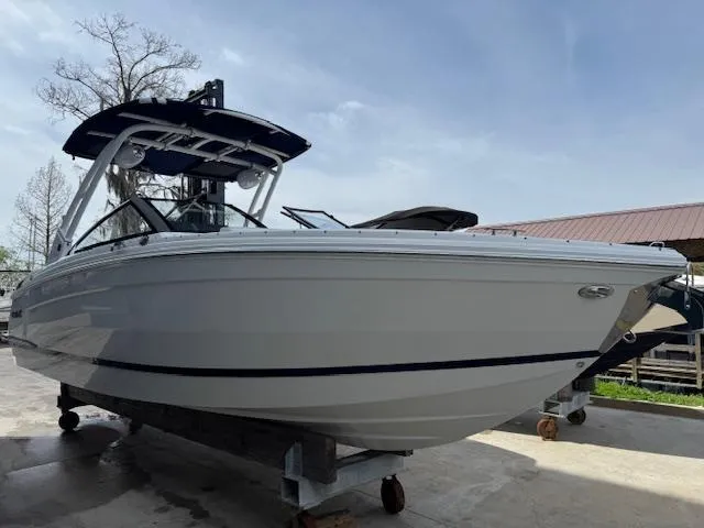 Slide: The Image of 2024 Cobalt R8 boat on display, featuring sleek design and modern features. - 1