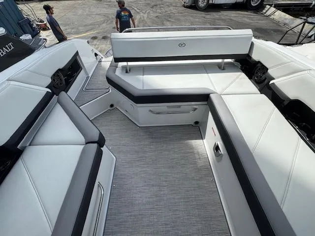 Slide: The Image of 2024 Cobalt R8 boat interior with spacious seating and modern design. - 12