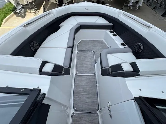 Slide: The Image of 2024 Cobalt R8 boat interior with spacious seating and modern design. - 9