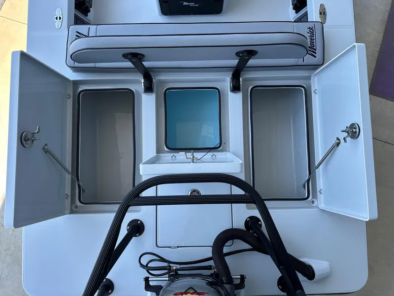 Slide: The Image of 2024 Maverick 18 HPX-V boat storage compartments and seating area. - 15